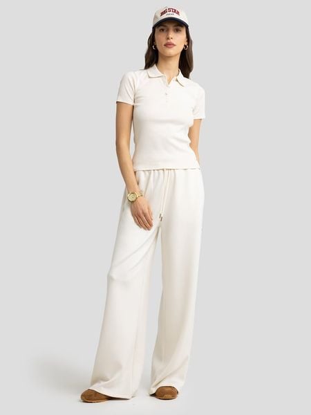 BIG STAR Koszulka polo w kolorze kremowym rozmiar: S. Brązowe koszulki damskie Big Star, s, bez wzorów, z bawełny, bez kołnierzyka, bez ramiączek. Za 79.21 zł.