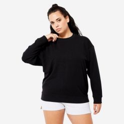 Bluza damska Domyos Gym & Pilates oversize. Czarne bluzy damskie DOMYOS, m, bez wzorów, z bawełny, bez kaptura. Za 59.99 zł.