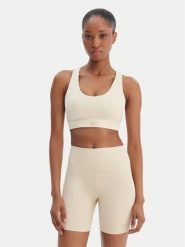 Reebok Biustonosz sportowy Reebok x Ewa Chodakowska Ela RK25615CCW Beżowy. Brązowe koszulki sportowe damskie Reebok, xs, bez wzorów, z syntetyku, bez ramiączek, na fitness i siłownię. Za 179.99 zł.