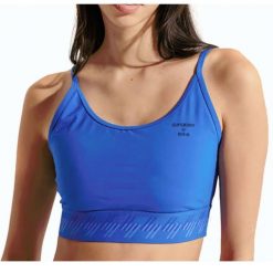 Biustonosz damski sportowy Superdry Essential Strappy. Niebieskie biustonosze sportowe damskie Superdry, bez wzorów, z bawełny. Za 102.00 zł.