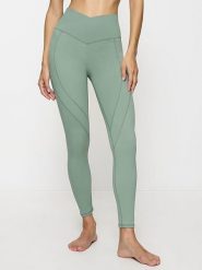 Triumph Legginsy sportowe w kolorze zielonym rozmiar: L. Zielone legginsy damskie Triumph, l, bez wzorów, z materiału. Za 131.74 zł.