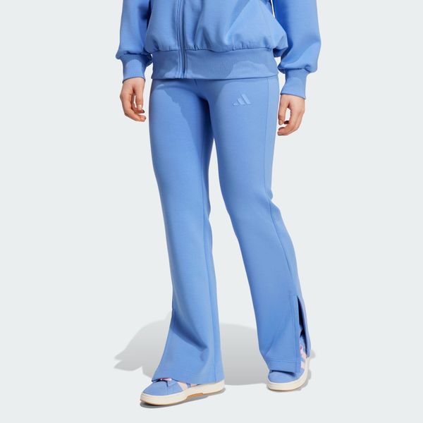 Spodnie Soft Lux Flared. Niebieskie rurki damskie Adidas, bez wzorów. Za 299.00 zł.