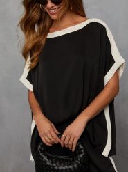 Milan Kiss Bluzka w kolorze czarnym rozmiar: M. Czarne bluzki damskie Milan Kiss, m, bez wzorów, bez kołnierzyka, bez ramiączek. Za 130.99 zł.