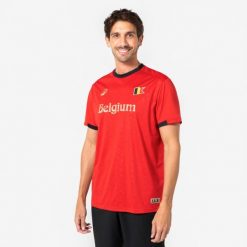 Koszulka piłkarska Belgia dla kibiców. Czarne bluzki damskie KIPSTA, s, bez wzorów, z materiału, sportowe, bez kołnierzyka, bez ramiączek. Za 44.99 zł.