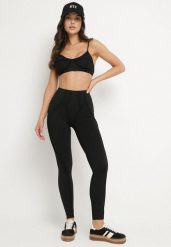 Czarny Komplet Sportowy z Ozdobnymi Przeszyciami Legginsy i Top na Ramiączkach Filinella. Czarne legginsy damskie Born2be, m, bez wzorów. Za 84.99 zł.