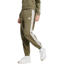 Spodnie damskie adidas Essentials 3-Stripes Fleece Loose-Fit. Zielone obuwie sportowe damskie Adidas, bez wzorów, z bawełny. Za 171.99 zł.