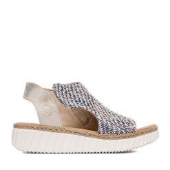 Sandały Rieker. Niebieskie sandały damskie Rieker, bez wzorów, bez obcasa, na koturnie, bez zapięcia. Za 329.99 zł.
