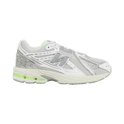 Damskie tenisówki New Balance 1906. Czerwone trampki damskie New Balance, bez wzorów, bez zapięcia. Za 634.00 zł.