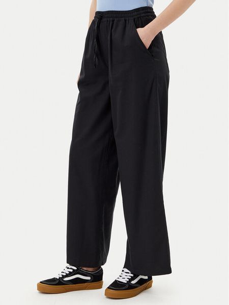 Volcom Spodnie materiałowe Dropping B1212503 Czarny Relaxed Fit. Czarne spodnie materiałowe damskie Volcom, bez wzorów, z bawełny. Za 169.99 zł.