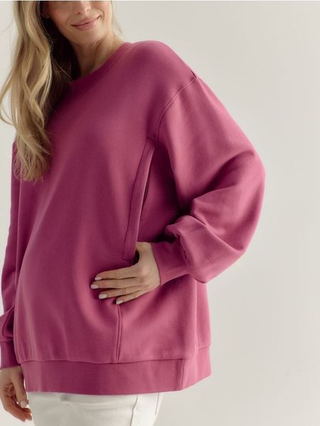 Bawełniana bluza - różowy. Czerwone bluzy damskie Reserved, l, bez wzorów, z bawełny, bez kaptura. W wyprzedaży za 119.99 zł.