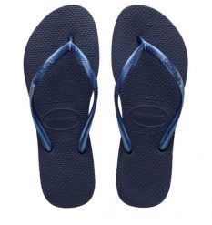 Klapki Havaianas Model 4000030 Kolor Niebieski. Niebieskie klapki damskie Havaianas, bez wzorów, z gumy, bez obcasa, bez zapięcia. Za 94.99 zł.