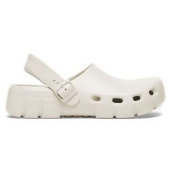 Klapki Birkenstock Birki Flow Eva 1027706 biale białe. Białe klapki damskie bez wzorów, z materiału, bez obcasa, bez zapięcia. Za 547.31 zł.