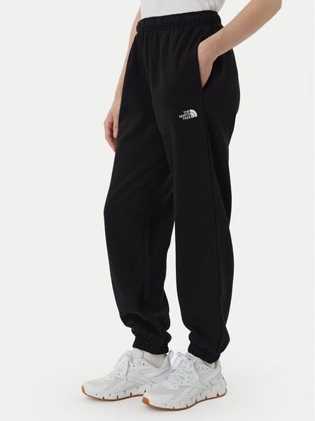The North Face Spodnie dresowe Evolution Simple Dome NF0A8CWV Czarny Regular Fit. Czarne spodnie dresowe damskie The North Face, l, bez wzorów, z dresówki. Za 279.99 zł.