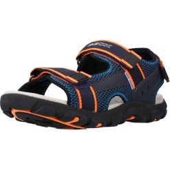 Sandały GEOX JR SANDAL STRADA A Niebieski. Niebieskie sandały damskie Geox, bez wzorów, ze skóry, bez obcasa, bez zapięcia. Za 139.99 zł.
