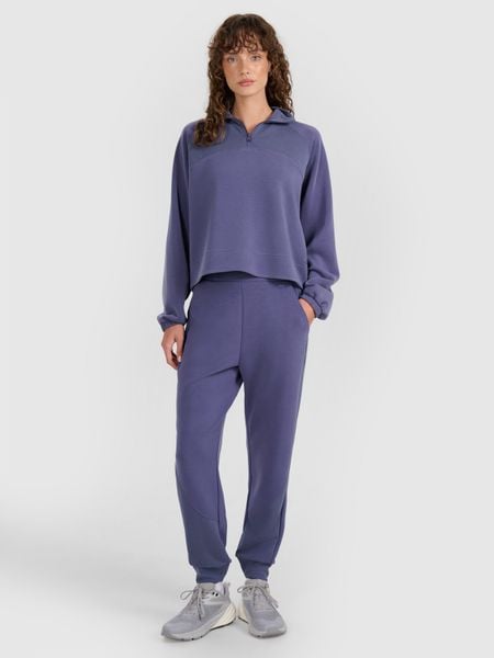 4F Spodnie dresowe joggery z modalem damskie - granatowe XL. Niebieskie spodnie dresowe damskie 4F, bez wzorów, z dresówki. W wyprzedaży za 159.99 zł.