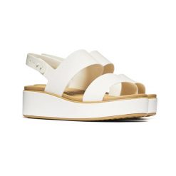 Damskie sandały Crocs BROOKLYN MATTE WRAP LOW WEDGE W 211802-00O 4. Białe sandały damskie Crocs, bez wzorów, z materiału, z okrągłym noskiem, bez obcasa, na koturnie, bez zapięcia. Za 204.42 zł.
