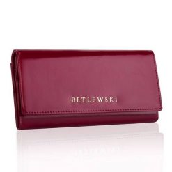 Portfel damski BETLEWSKI BPD-OL-100 bordowy. Czerwone portfele damskie Betlewski, bez wzorów, ze skóry. Za 169.99 zł.