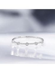 DIAMOND & CO Złoty pierścionek "Ensemble" z diamentami rozmiar: 50. Szare pierścionki damskie Diamond & Co, z diamentem, złote. Za 505.13 zł.