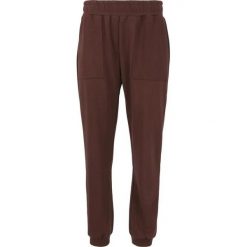 Damskie spodnie dresowe Athlecia Elaina. Brązowe spodnie dresowe damskie Athlecia, na lato, bez wzorów, z dresówki. Za 257.00 zł.