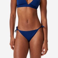 Dół kostiumu kąpielowego damski Decathlon Sandy Zuma. Niebieskie bikini OLAIAN, bez wzorów, z elastanu. Za 39.99 zł.
