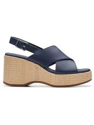 Clarks Skórzane sandały "Manon Wish" w kolorze granatowym na obcasie rozmiar: 41.5. Niebieskie sandały damskie Clarks, bez wzorów, z otwartym noskiem, bez obcasa, na koturnie, bez zapięcia. Za 259.13 zł.