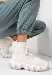 Jasnobeżowe Sneakersy Zarinaith. Brązowe obuwie sportowe damskie Born2be, bez zapięcia. Za 99.99 zł.