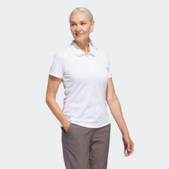 Koszulka polo do golfa damska ADIDAS. Bluzki damskie Adidas, s, bez wzorów, bez kołnierzyka, bez ramiączek. Za 209.99 zł.
