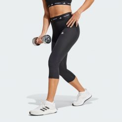 Legginsy capri TECHFIT. Czarne legginsy damskie Adidas, xs, bez wzorów, z materiału. Za 179.00 zł.