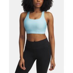 Biustonosz sportowy UA Crossback Mid Bra 1361034-494 S. Czarne biustonosze sportowe damskie Under Armour, bez wzorów. Za 121.99 zł.