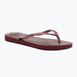 Japonki damskie Havaianas Slim Gloss. Czerwone klapki damskie Havaianas, bez wzorów, z materiału, z otwartym noskiem, bez obcasa, bez zapięcia. Za 109.99 zł.