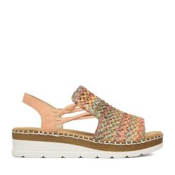 Sandały Rieker. Sandały damskie Rieker, bez wzorów, bez obcasa, na koturnie, bez zapięcia. Za 319.99 zł.