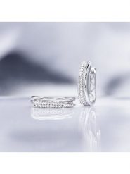 DIAMOND & CO Złote kolczyki-kreole "Créole Maya" z diamentami rozmiar: onesize. Szare kolczyki damskie Diamond & Co, z diamentem, złote. Za 1,892.99 zł.