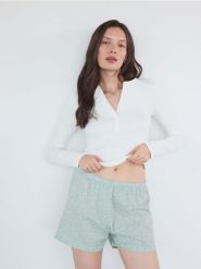 Piżamowe szorty 2 pack - jasnozielony. Zielone piżamy damskie Reserved, bez wzorów, z bawełny, bez ramiączek. W wyprzedaży za 49.99 zł.