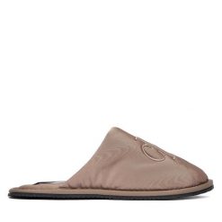 Kapcie Calvin Klein Jeans. Brązowe kapcie damskie Calvin Klein Jeans, z jeansu. Za 209.99 zł.
