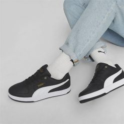 Sneakersy unisex Caven 2.0 PUMA Black White Gold. Białe obuwie sportowe damskie Puma, bez zapięcia, trekkingowe. Za 259.00 zł.