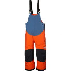 Spodnie funkcyjne "Rider" w kolorze pomarańczowo-niebieskim. Brązowe spodnie materiałowe dziewczęce Helly Hansen, z materiału. W wyprzedaży za 143.95 zł.