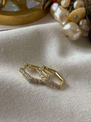 Luseera Pozłacane kolczyki-kreole z cyrkoniami rozmiar: onesize. Żółte kolczyki damskie Luseera, z cyrkonią, pozłacane. Za 91.56 zł.