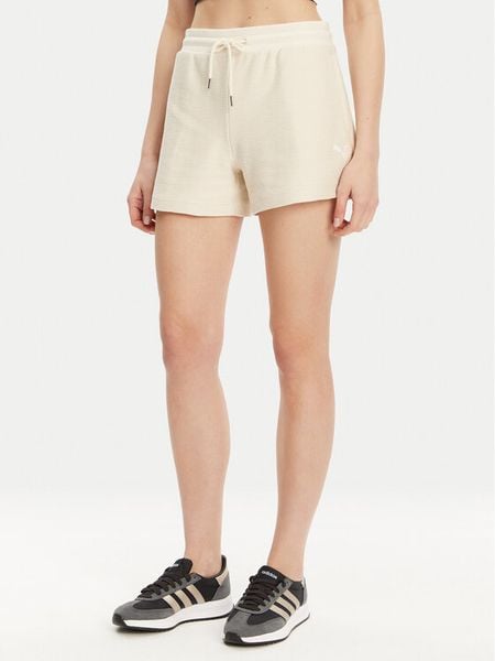 Puma Szorty sportowe Ess 629782 Beżowy Regular Fit. Brązowe spodenki sportowe damskie Puma, xl, bez wzorów, z bawełny. Za 229.99 zł.