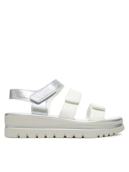 Clara Barson Sandały WFA3897-1 Biały. Białe sandały damskie Clara Barson, bez wzorów, z materiału, bez obcasa, na koturnie, bez zapięcia. Za 119.99 zł.