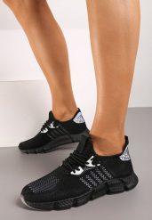 Czarne Wsuwane Buty Sportowe na Płaskiej Podeszwie ze Żłobieniami Seshea. Czarne obuwie sportowe casual damskie Born2be. Za 64.99 zł.