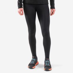 Legginsy do biegania w terenie damskie Kiprun Run 900. Czarne legginsy damskie EVADICT, s, bez wzorów, ze skóry. Za 119.99 zł.