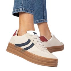 Beżowe sneakersy trampki damskie z granatowym dodatkiem białe. Białe trampki damskie bez wzorów, z syntetyku, przed kostkę, bez zapięcia. Za 96.19 zł.