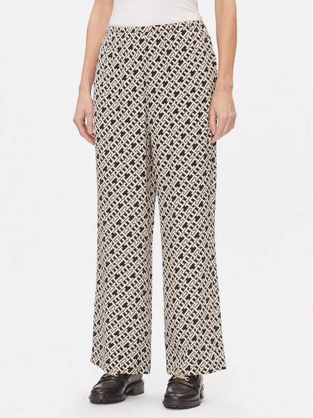 Tommy Hilfiger Spodnie materiałowe WW0WW41023 Kolorowy Relaxed Fit. Spodnie materiałowe damskie Tommy Hilfiger, bez wzorów, z materiału. Za 449.99 zł.