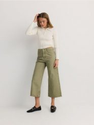 Jeansy culotte z wysokim stanem - zielony. Zielone jeansy damskie Reserved, z podwyższonym stanem. Za 139.99 zł.