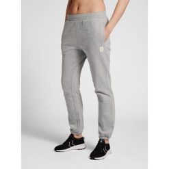Damskie spodnie dresowe Hummel GG 12. Szare spodnie dresowe damskie Hummel, s, bez wzorów, z dresówki. W wyprzedaży za 149.50 zł.
