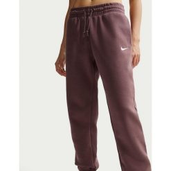 Spodnie sportowe damskie Nike FZ7626502. Brązowe spodnie sportowe damskie Nike, l, bez wzorów, z bawełny, na fitness i siłownię. Za 389.99 zł.