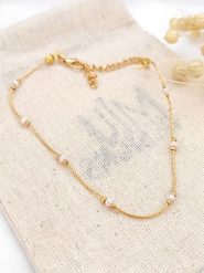 Atelier MIU Pozłacana bransoletka z elementami ozdobnymi na kostkę rozmiar: onesize. Białe bransoletki damskie atelier MIU, pozłacane. Za 52.67 zł.