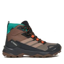 Trekkingi adidas. Brązowe obuwie trekkingowe damskie Adidas, z gore-texu, bez zapięcia. Za 699.99 zł.
