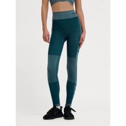 Damskie legginsy bezszwowe z wysokim stanem Hummel Clea. Niebieskie legginsy damskie Hummel, bez wzorów, z materiału, z podwyższonym stanem, na fitness i siłownię. Za 170.00 zł.