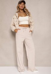 Beżowe Bawełniane Spodnie o Szerokim Kroju High Waist z Lampasami Pillorra. Brązowe spodnie materiałowe damskie Renee, bez wzorów, z bawełny. Za 109.99 zł.